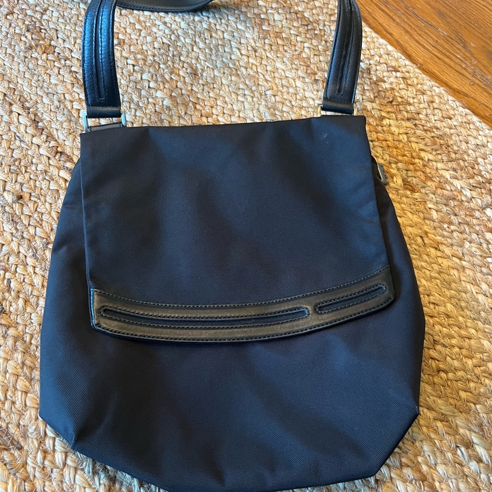 Tumi Black nylon cross body